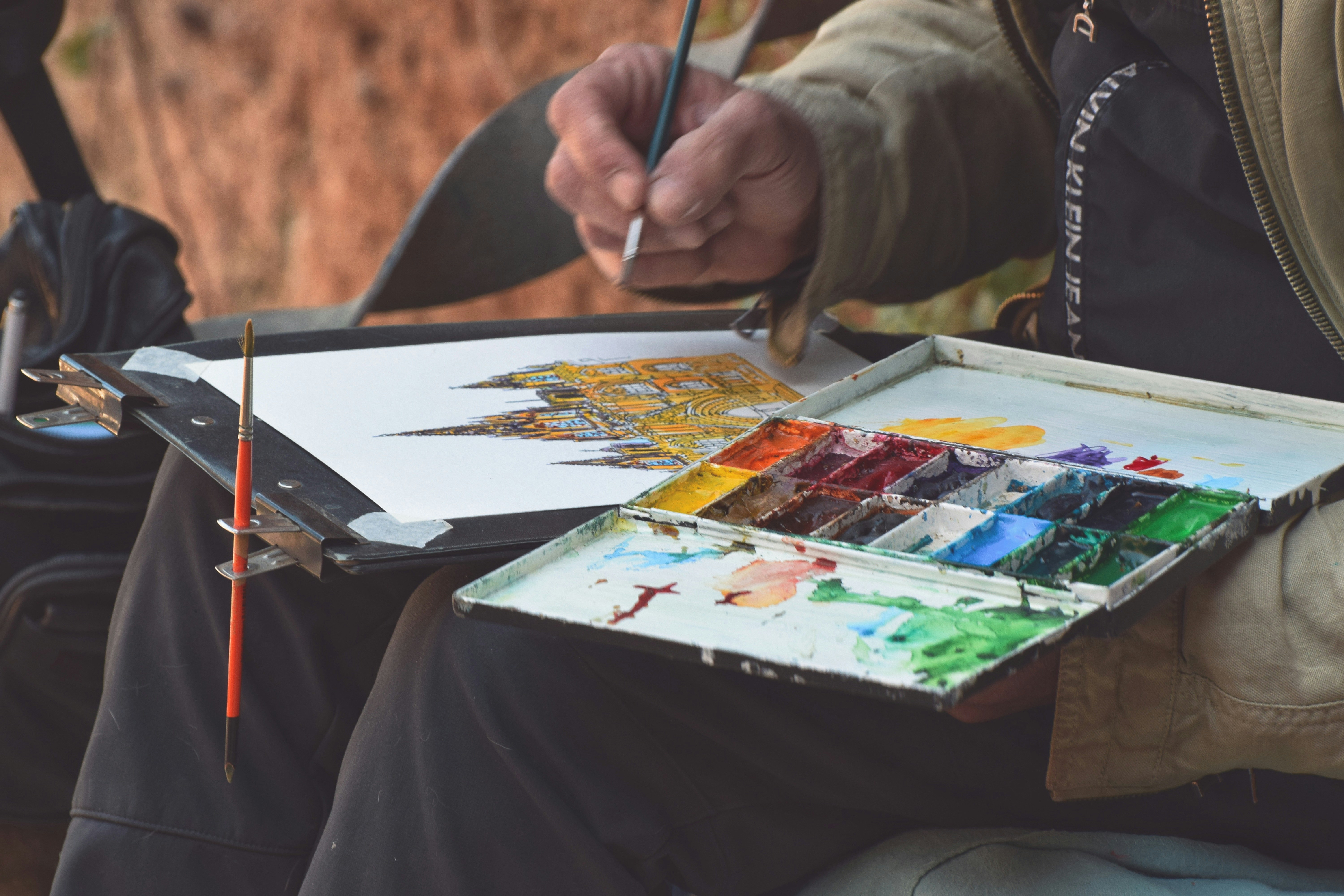 An artist doing some urban sketching.